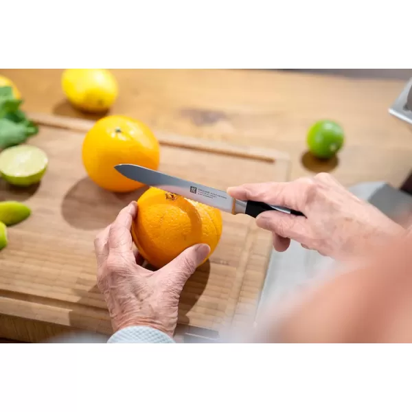 ZWILLING Four Star 5-inch Serrated Utility Knife, Black